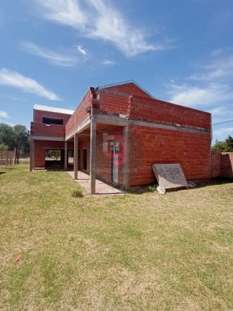 Terreno con construcción