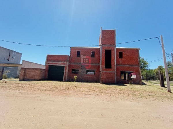 Terreno con construcción