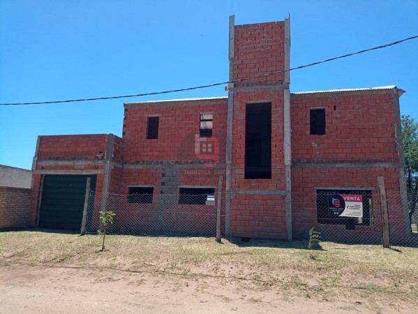 Terreno con construcción