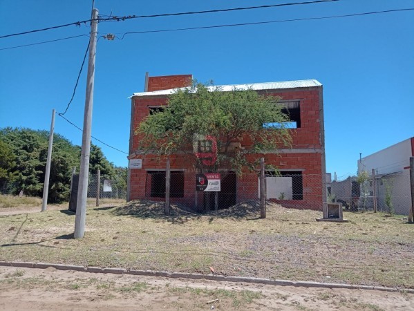 Terreno con construcción