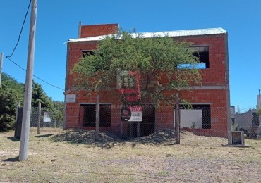 Terreno con construcción